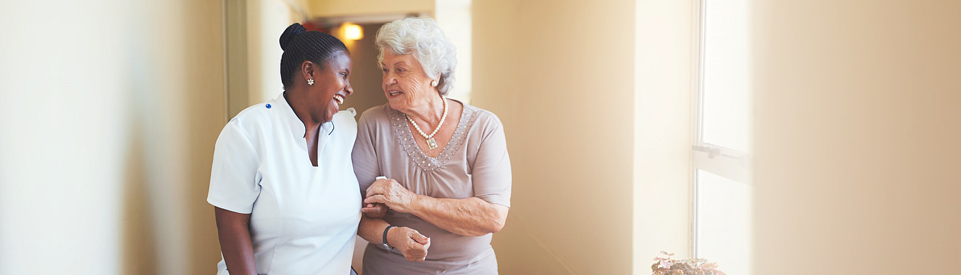 Caregiver and senior talking