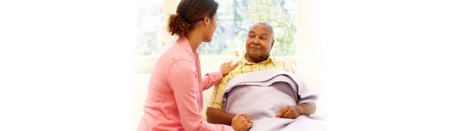 caregiver taking care of her patient